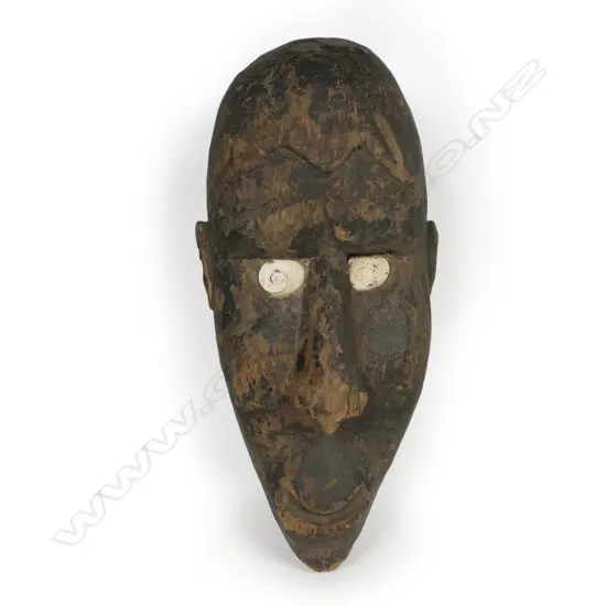Vanuatu guardian figure head with shell inset eyes,